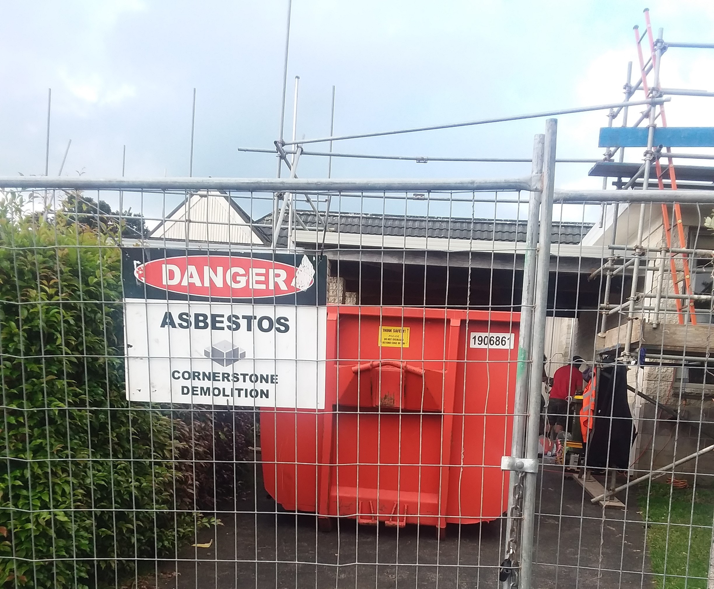 Asbestos removal team in protective equipment